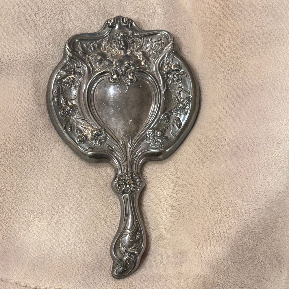 Vintage Silver Hand Mirror - Decorative Home Accent.